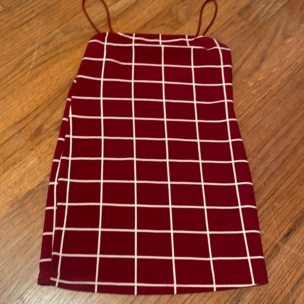 From shein size 8y US - 128 EU. Red and white tight dress.
